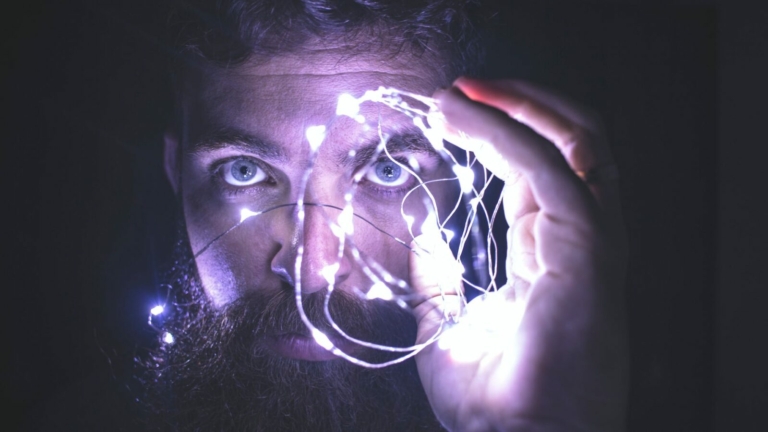 person holding string lights photo